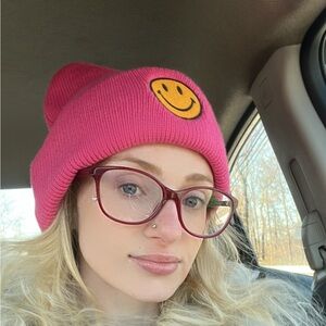 Pink smiley face beanie